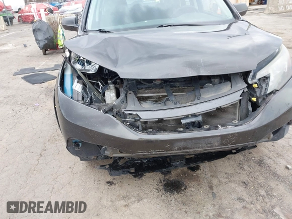 2014 Honda CR-V LX with VIN 2HKRM4H33EH661582, listed as a IAAI auction lot 42002466 with 191,073 mi miles. Bid and sale history available at carsss.com. Image 6.