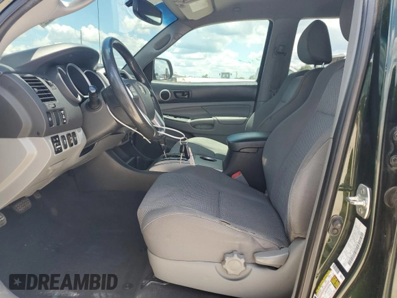 2012 Toyota Tacoma with VIN 3TMLU4EN6CM098434, listed as a Copart auction lot 56422005 with 151,228 mi miles and Salvage title. Bid and sale history available at DreamBid. Image 7.