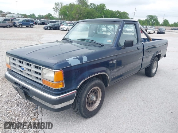 1990 Ford Ranger XLT z VIN 1FTCR10X1LPB26207, wystawiony jako IAAI lot #42306083 z przebiegiem 39 173 mil mil oraz . Historia ofert i sprzedaży dostępna na DreamBid. Obrazek 2.