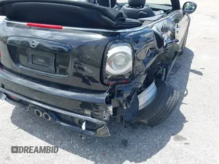 2021 MINI Convertible Cooper S z VIN WMWWJ5C0XM3M08622, wystawiony jako IAAI lot #42507679 z przebiegiem 36 932 mil mil oraz . Historia ofert i sprzedaży dostępna na DreamBid. Obrazek 6.