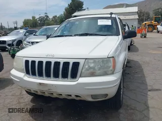 2002 Jeep Grand Cherokee Limited with VIN 1J4GX58S52C305020, listed as a IAAI auction lot 42025324 with 214,214 mi miles and . Bid and sale history available at DreamBid. Image 6.