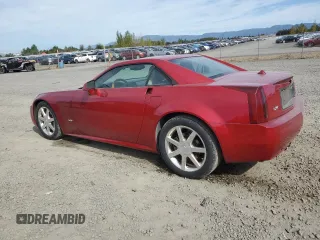 2005 Cadillac XLR z VIN 1G6YV34AX55600501, wystawiony jako Copart lot #72423004 z przebiegiem 31 601 mil mil oraz Szkody całkowita. Historia ofert i sprzedaży dostępna na DreamBid. Obrazek 2.