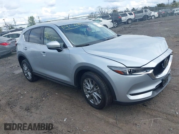 2021 Mazda CX-5 Grand Touring with VIN JM3KFBDM3M0354348, listed as a IAAI auction lot 41924207 with 45,786 mi miles. Bid and sale history available at carsss.com. Image 1.