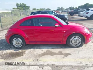 2013 Volkswagen Beetle 2.5L w/Sun/Sound/Nav with VIN 3VWJX7AT4DM672158, listed as a IAAI auction lot 42187543 with 94,961 mi miles and . Bid and sale history available at DreamBid. Image 13.