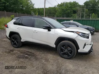 2019 Toyota RAV4 Hybrid XSE with VIN JTMEWRFV4KJ004433, listed as a Copart auction lot 58400445 with 101,108 mi miles and Salvage title. Bid and sale history available at DreamBid. Image 4.