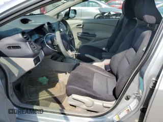 2010 Honda Insight EX with VIN JHMZE2H77AS015329, listed as a Copart auction lot 60502835 with 213,397 mi miles and Clean title. Bid and sale history available at DreamBid. Image 7.
