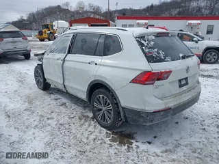2018 Volkswagen Tiguan SEL with VIN 3VV2B7AX6JM061232, listed as a IAAI auction lot 41456802 with 114,489 mi miles. Bid and sale history available at carsss.com. Image 3.
