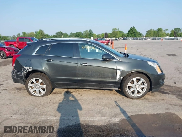 2014 Cadillac SRX Performance Collection with VIN 3GYFNFE35ES663320, listed as a IAAI auction lot 42480235 with 112,406 mi miles and . Bid and sale history available at DreamBid. Image 13.