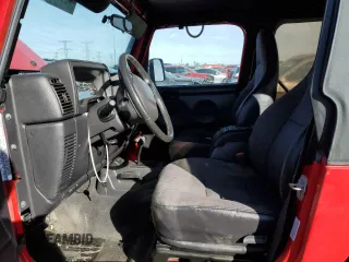 2002 Jeep Wrangler X with VIN 1J4FA39S32P771120, listed as a Copart auction lot 42636665 with 153,168 mi miles and Salvage Title. Bid and sale history available at carsss.com. Image 7.