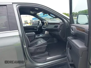 2023 Chevrolet Suburban Premier with VIN 1GNSCFKD2PR377493, listed as a IAAI auction lot 42426988 with 71,365 mi miles and . Bid and sale history available at DreamBid. Image 5.
