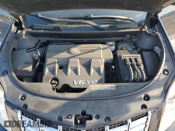 2016 Cadillac SRX Luxury Collection z VIN 3GYFNBE32GS551599, wystawiony jako Copart lot #56369345 z przebiegiem 90 190 mil mil oraz Szkoda całkowita • Salvage title. Historia ofert i sprzedaży dostępna na DreamBid. Obrazek 12.