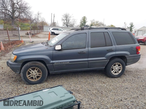 2003 Jeep Grand Cherokee Laredo with VIN 1J4GX48SX3C604904, listed as a IAAI auction lot 40884443 with 188,352 mi miles. Bid and sale history available at carsss.com. Image 14.