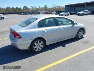 2009 Honda Civic Sdn LX with VIN 2HGFA16589H309581, listed as a IAAI auction lot 41825468 with 110,986 mi miles. Bid and sale history available at carsss.com. Image 4.