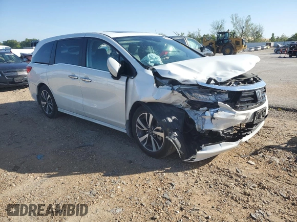 2021 Honda Odyssey Touring with VIN 5FNRL6H86MB003309, listed as a Copart auction lot 51648654 with 132,393 mi miles and Salvage Title. Bid and sale history available at carsss.com. Image 4.