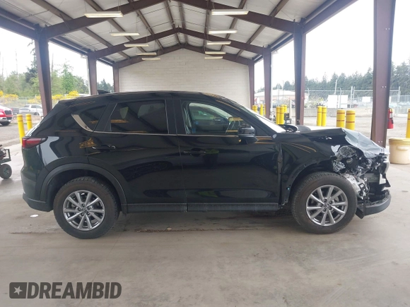 2023 Mazda CX-5 S Carbon Edition z VIN JM3KFBCM8P0140333, wystawiony jako IAAI lot #42292848 z przebiegiem 49 587 mil mil oraz . Historia ofert i sprzedaży dostępna na DreamBid. Obrazek 14.