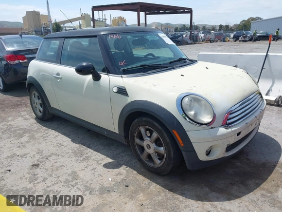 2009 MINI Cooper Hardtop with VIN WMWMF33569TU75508, listed as a IAAI auction lot 42090523 with 247,856 mi miles. Bid and sale history available at carsss.com. Image 1.