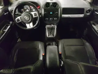 2014 Jeep Compass Latitude with VIN 1C4NJDEB6ED648267, listed as a Copart auction lot 48865825 with 146,244 mi miles and Salvage Title. Bid and sale history available at carsss.com. Image 8.