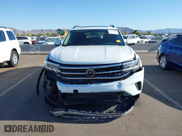 2023 Volkswagen Atlas SE с VIN 1V2JR2CA8PC548121, выставлен на аукционе IAAI как лот 42129010 с пробегом 42 621 миль миль и . История ставок и продаж доступна на DreamBid. Изображение 12.