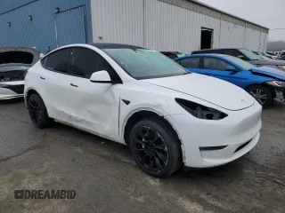 2023 Tesla Model Y Long Range z VIN 7SAYGDEE7PA102174, wystawiony jako Copart lot #49904435 z przebiegiem 144 702 mil mil oraz Szkoda całkowita • Salvage title. Historia ofert i sprzedaży dostępna na DreamBid. Obrazek 4.