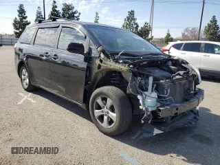 2015 Toyota Sienna LE AAS with VIN 5TDKK3DC8FS610940, listed as a Copart auction lot 47390285 with 128,893 mi miles and Salvage Title. Bid and sale history available at carsss.com. Image 4.