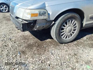 2006 Mercury Grand Marquis LS Premium z VIN 2MEHM75W56X605511, wystawiony jako IAAI lot #41642522 z przebiegiem 120 054 mil mil oraz . Historia ofert i sprzedaży dostępna na DreamBid. Obrazek 6.