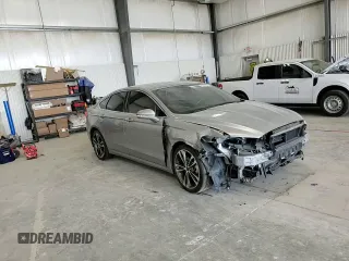 2020 Ford Fusion Titanium с VIN 3FA6P0K90LR112034, выставлен на аукционе Copart как лот 56740025 с пробегом 89 117 миль миль и Списание • Salvage title. История ставок и продаж доступна на DreamBid. Изображение 13.
