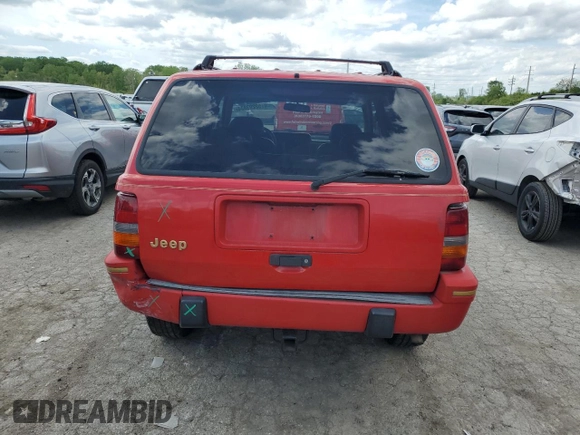 1995 Jeep Grand Cherokee Limited with VIN 1J4GZ78S7SC678078, listed as a Copart auction lot 52203834 with 269,423 mi miles and Salvage title. Bid and sale history available at DreamBid. Image 6.