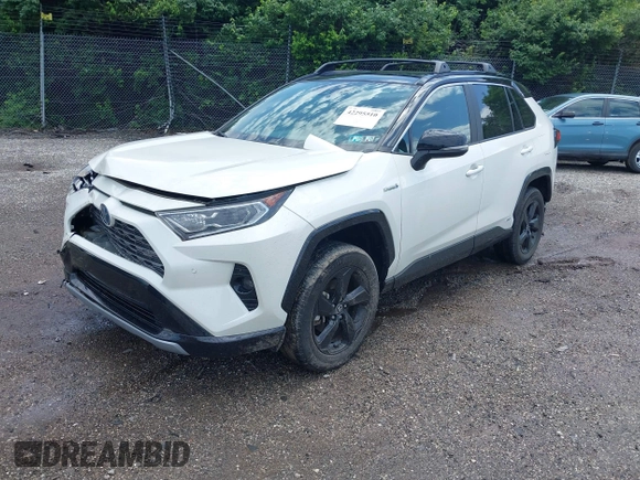 2021 Toyota RAV4 Hybrid XSE with VIN 4T3E6RFV9MU052563, listed as a IAAI auction lot 42295510 with 24,771 mi miles and . Bid and sale history available at DreamBid. Image 18.