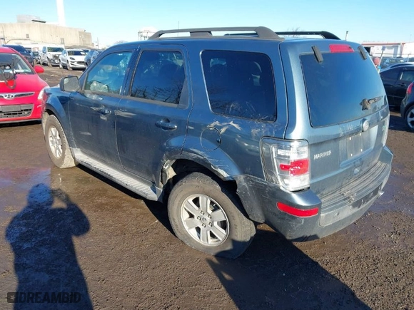 2010 Mercury Mariner with VIN 4M2CN9BG0AKJ02637, listed as a IAAI auction lot 41579241 with 128,095 mi miles. Bid and sale history available at carsss.com. Image 3.