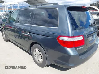 2006 Honda Odyssey EX-L with VIN 5FNRL38626B461798, listed as a IAAI auction lot 41751495 with 125,952 mi miles. Bid and sale history available at carsss.com. Image 3.