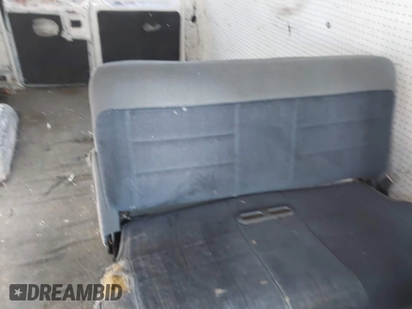 2001 Ford Econoline Cargo Commercial with VIN 1FTNE24L21HA95140, listed as a IAAI auction lot 41490323 with 330,136 mi miles and . Bid and sale history available at carsss.com. Image 8.