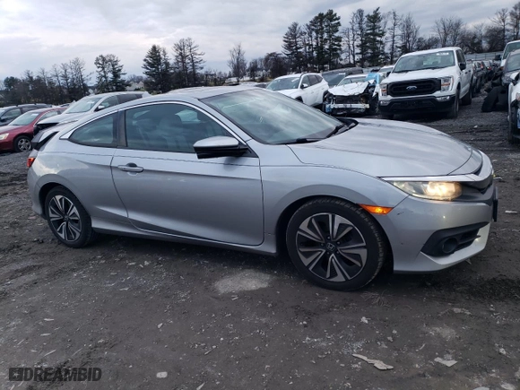 2016 Honda Civic Coupe EX-T with VIN 2HGFC3B36GH356910, listed as a Copart auction lot 86734524 with 144,332 mi miles and Salvage Title. Bid and sale history available at carsss.com. Image 4.