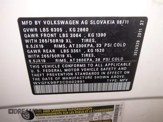 2012 Volkswagen Touareg Sport with VIN WVGFK9BP2CD002991, listed as a IAAI auction lot 42077523 with 94,515 mi miles and . Bid and sale history available at DreamBid. Image 9.