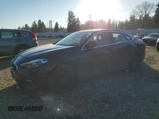 2021 BMW 2 Series 228i xDrive with VIN WBA73AK00M7H59317, listed as a Copart auction lot 42590905 with 67,661 mi miles and Salvage title. Bid and sale history available at DreamBid. Image 1.