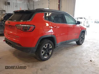 2018 Jeep Compass Trailhawk with VIN 3C4NJDDB4JT169366, listed as a IAAI auction lot 42389456 with 128,980 mi miles and . Bid and sale history available at DreamBid. Image 4.