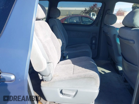 1999 Toyota Sienna LE with VIN 4T3ZF13C2XU126738, listed as a IAAI auction lot 41012127 with 218,080 mi miles. Bid and sale history available at carsss.com. Image 8.
