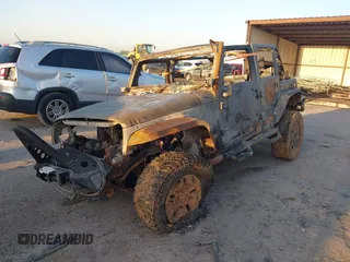 2014 Jeep Wrangler Unlimited Rubicon with VIN 1C4HJWFG8EL159345, listed as a IAAI auction lot 41846272 with Not provided miles and . Bid and sale history available at DreamBid. Image 2.