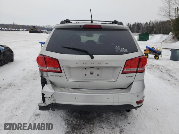 2013 Dodge Journey Crew with VIN 3C4PDCCG4DT698618, listed as a Copart auction lot 87632875 with 198,284 mi miles and Salvage title. Bid and sale history available at DreamBid. Image 6.