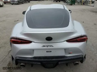 2021 Toyota GR Supra 3.0 with VIN WZ1DB0C0XMW039660, listed as a Copart auction lot 86909354 with 30,272 mi miles and Salvage Title. Bid and sale history available at carsss.com. Image 6.