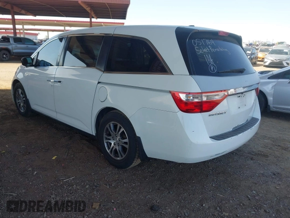 2012 Honda Odyssey EX-L with VIN 5FNRL5H67CB051764, listed as a IAAI auction lot 42493181 with 167,189 mi miles and . Bid and sale history available at DreamBid. Image 3.