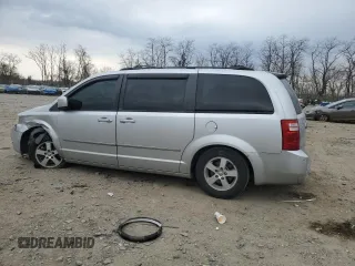 2010 Dodge Grand Caravan SXT with VIN 2D4RN5D14AR118765, listed as a Copart auction lot 50819035 with 162,041 mi miles and Salvage Title. Bid and sale history available at DreamBid. Image 2.