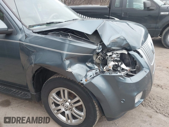 2010 Mercury Mariner Premier with VIN 4M2CN9H75AKJ06979, listed as a IAAI auction lot 41156374 with 149,784 mi miles and . Bid and sale history available at DreamBid. Image 12.