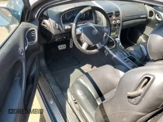 2004 Pontiac GTO z VIN 6G2VX12G24L282560, wystawiony jako Copart lot #67750724 z przebiegiem 153 582 mil mil oraz Szkody całkowita. Historia ofert i sprzedaży dostępna na DreamBid. Obrazek 8.