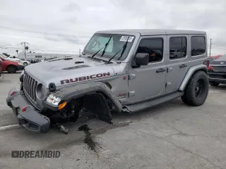 2018 Jeep Wrangler Unlimited Rubicon with VIN 1C4HJXFG9JW237646, listed as a Copart auction lot 52906915 with 43,667 mi miles and Salvage title. Bid and sale history available at DreamBid. Image 1.