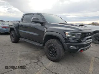 2024 Ram 1500 TRX with VIN 1C6SRFU94RN135421, listed as a Copart auction lot 82037944 with 6,969 mi miles and Salvage Title. Bid and sale history available at carsss.com. Image 4.