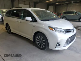 2018 Toyota Sienna XLE with VIN 5TDDZ3DC9JS204307, listed as a Copart auction lot 57327715 with 70,886 mi miles and Salvage title. Bid and sale history available at DreamBid. Image 4.