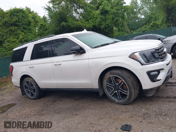 2019 Ford Expedition Limited z VIN 1FMJU2AT1KEA41705, wystawiony jako IAAI lot #42285780 z przebiegiem Nie podano mil oraz . Historia ofert i sprzedaży dostępna na DreamBid. Obrazek 13.
