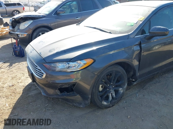 2019 Ford Fusion SE with VIN 3FA6P0HD2KR251012, listed as a IAAI auction lot 40626475 with 60,596 mi miles and . Bid and sale history available at DreamBid. Image 6.
