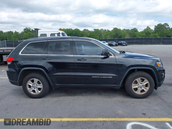2016 Jeep Grand Cherokee Laredo with VIN 1C4RJEAG0GC320683, listed as a IAAI auction lot 42379025 with 124,750 mi miles and . Bid and sale history available at DreamBid. Image 13.