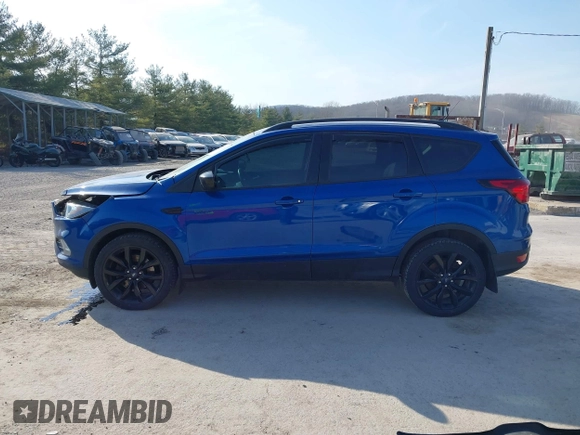 2019 Ford Escape SE with VIN 1FMCU9GD7KUB44070, listed as a IAAI auction lot 41801706 with 77,612 mi miles. Bid and sale history available at carsss.com. Image 14.